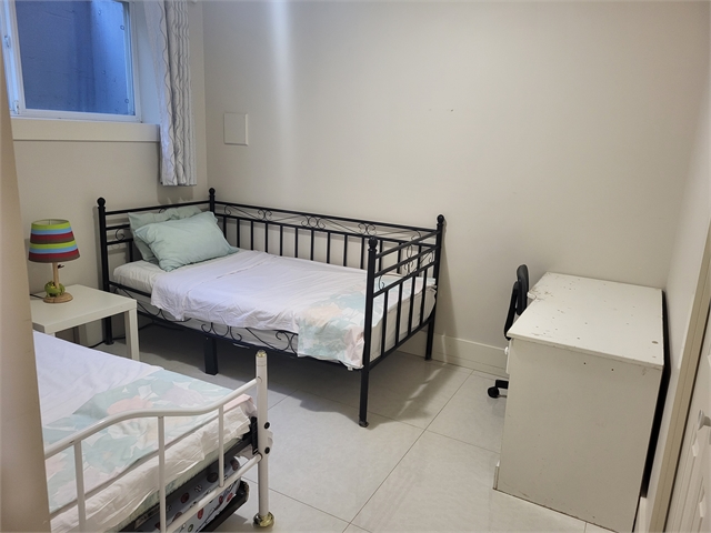 2 Bedroom basement suite, 5 minutes walk to sky train and bus hubs